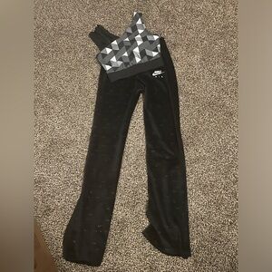 Size XS Nike sports bra and Size Small flared fleece leggings.